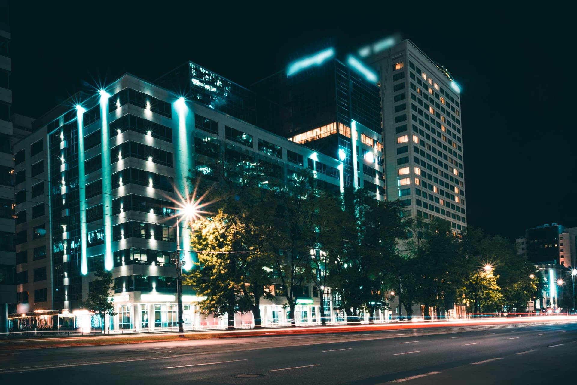Denver downtown skyline at night with illuminated office buildings
